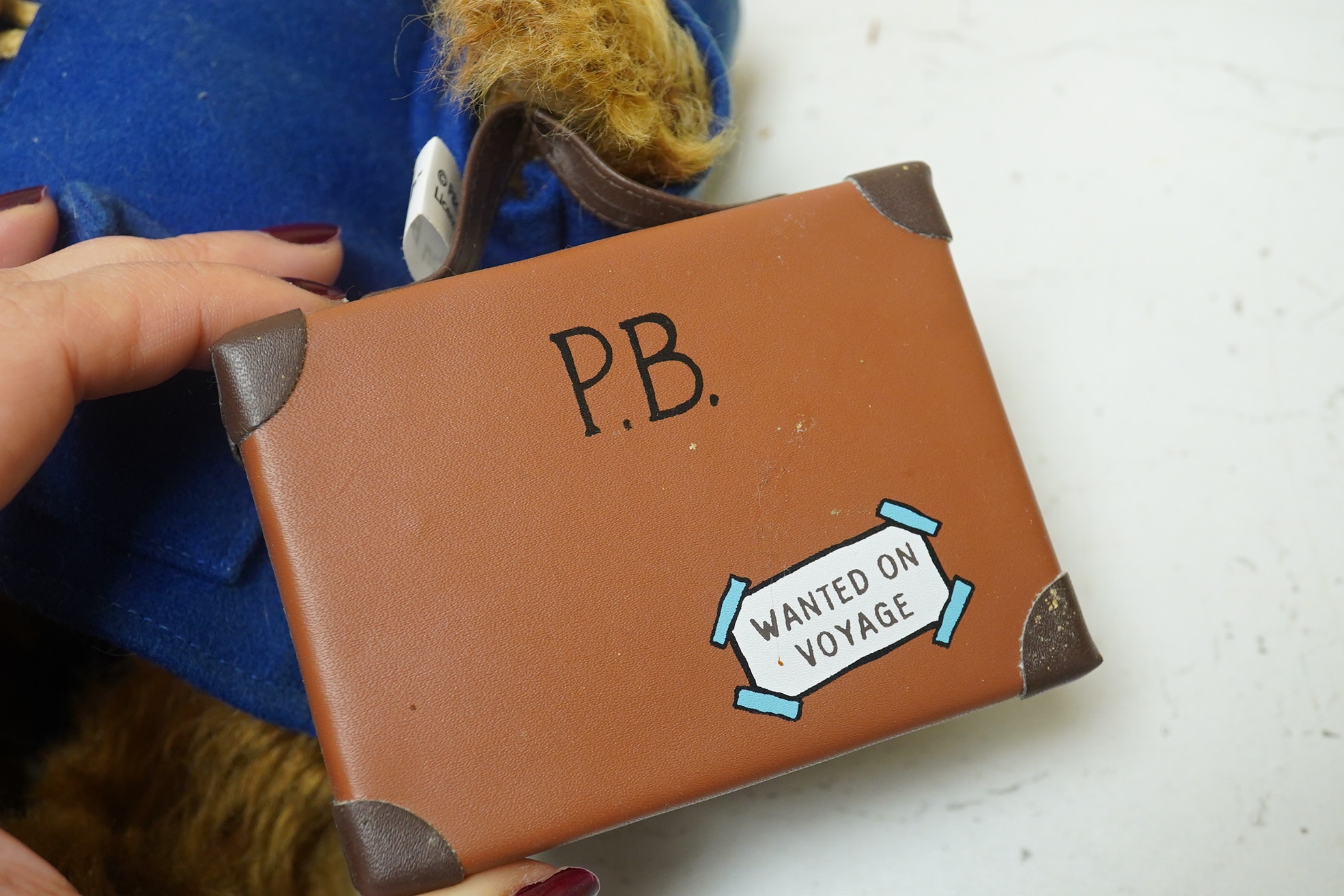 A Steiff white label bear, sealing wax nose, 48, a Steiff white label Paddington bear with certificate 28 (2). Condition - fair to good.